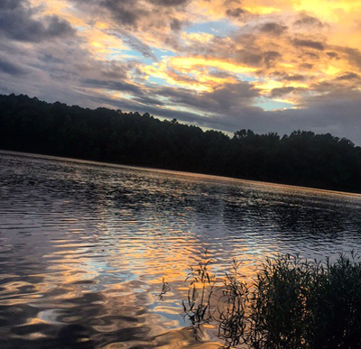 Sun Beginning to Set Over Lake